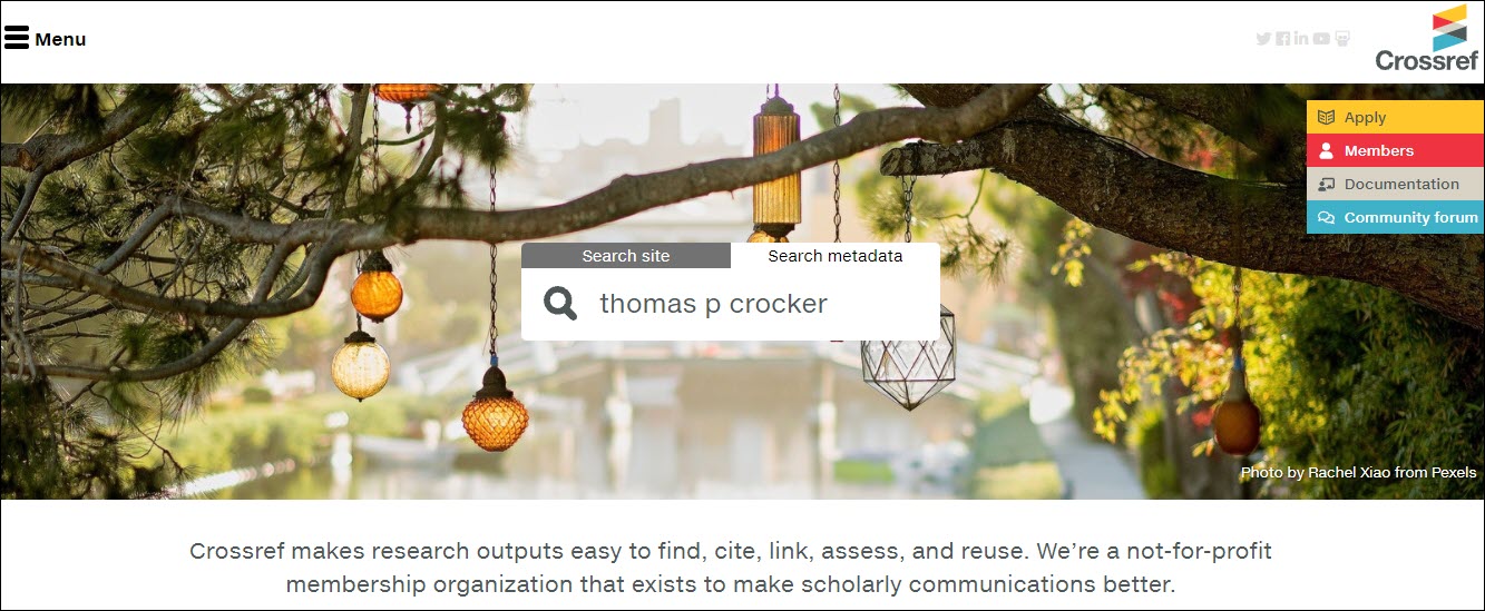 The search screen from CrossRef with M"search metadata" selected and "thomas p crocker" entered as the search term sans the quotation marks